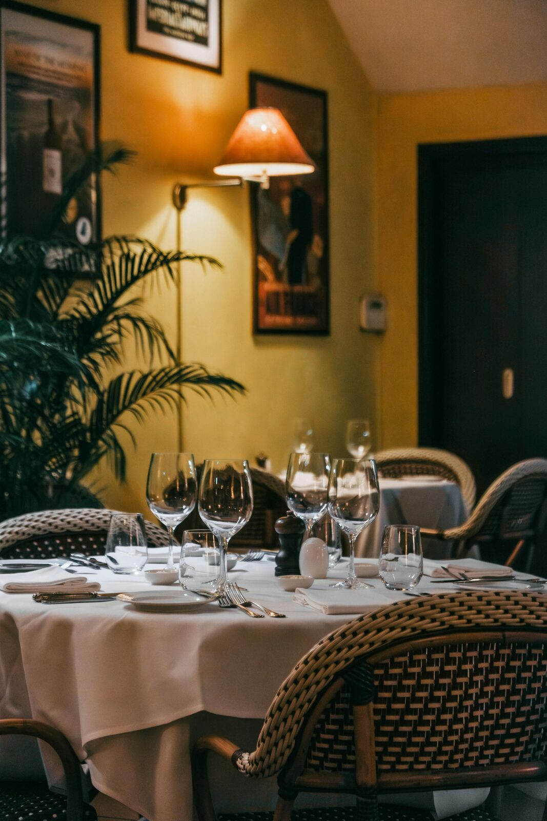 French bistro yellow walls white tablecloth