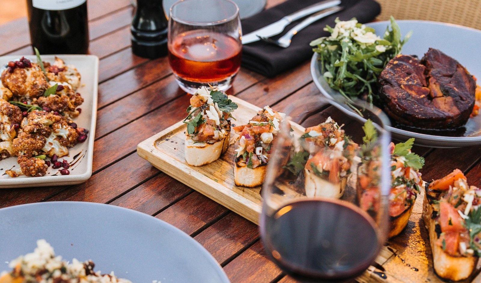 A grand tasting pavilion with wine glasses at the Food and Wine Classic in Aspen
