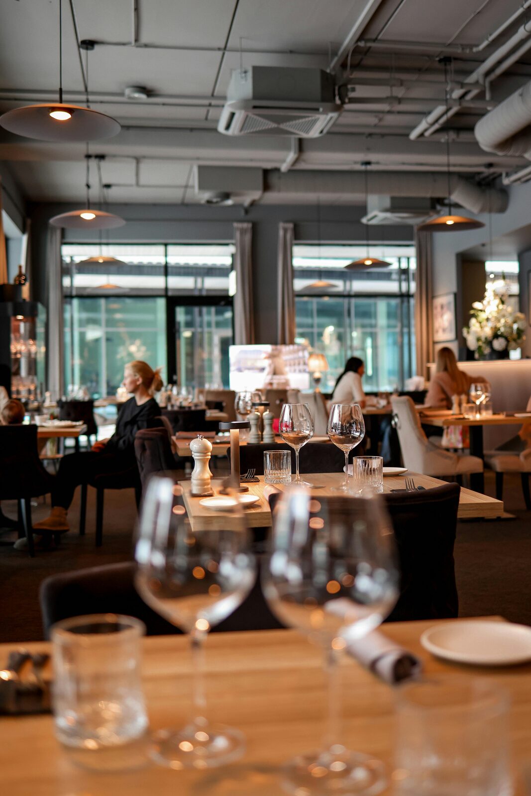 Modern restaurant interior with wine glasses